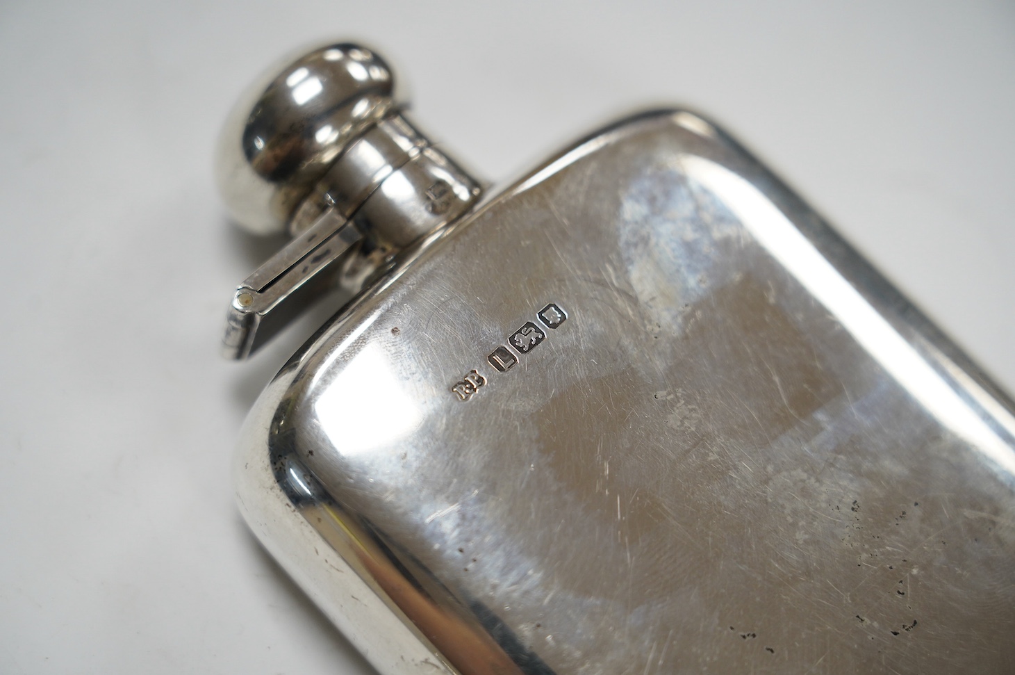 A George VI silver hip flask, Robert Pringle & Sons, London, 1946, 15.2cm, 8oz. Condition - fair